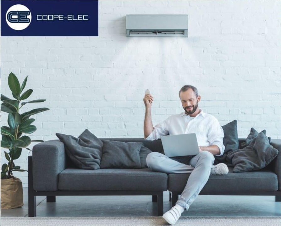 image of a person using a laptop with air conditioner