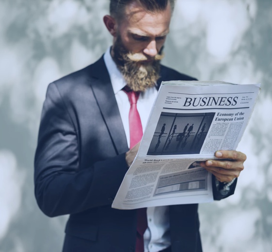 Male reading a newspaper