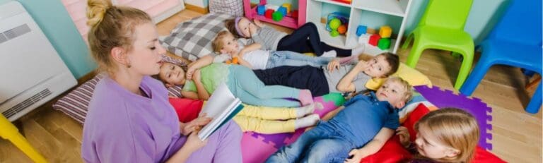 Children listening to their teacher tell a story