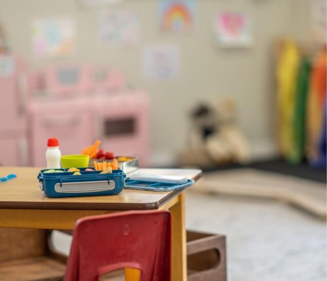Image of table with kid lunch