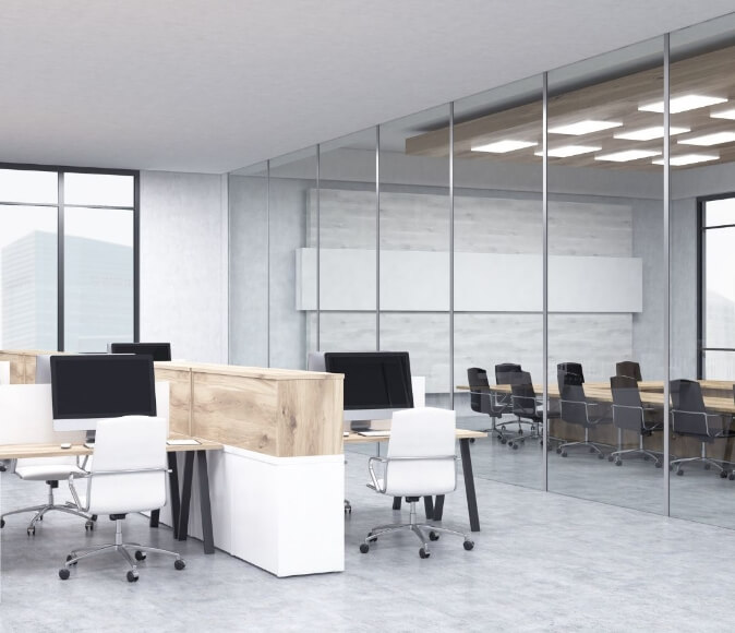empty office with table, chairs and glass walls